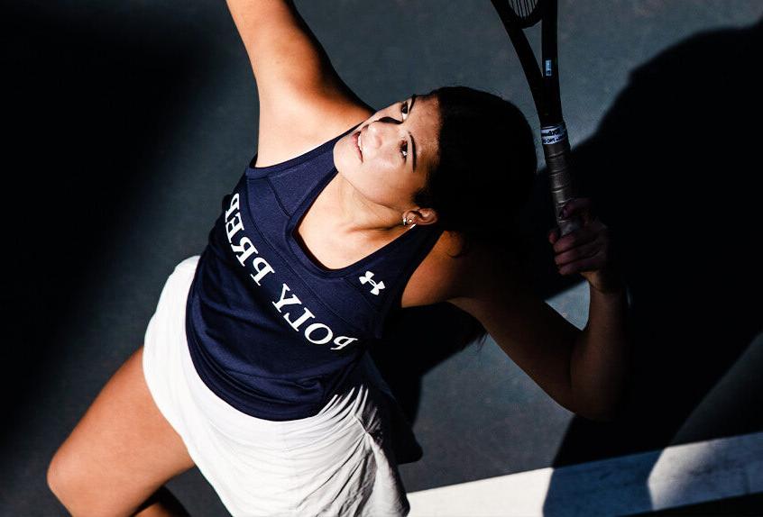 Girls Tennis player hitting the tennis ball